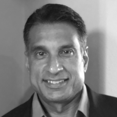 A speaker photo for Kris Radhakrishnan