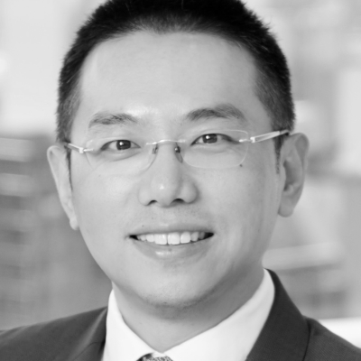 A speaker photo for Aidan Yao