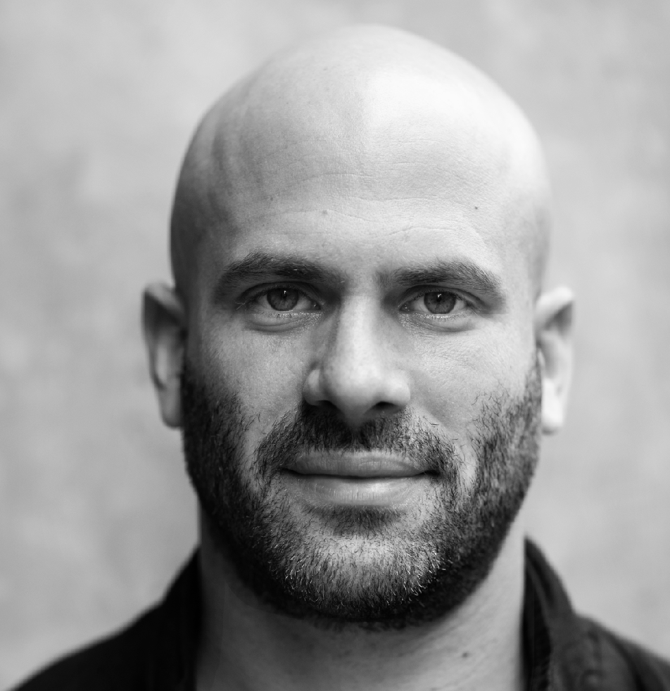 A speaker photo for Sam Kass