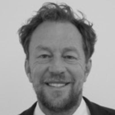 A speaker photo for Simon Champ