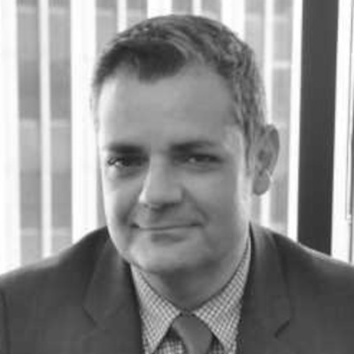 A speaker photo for Johnny Minassian