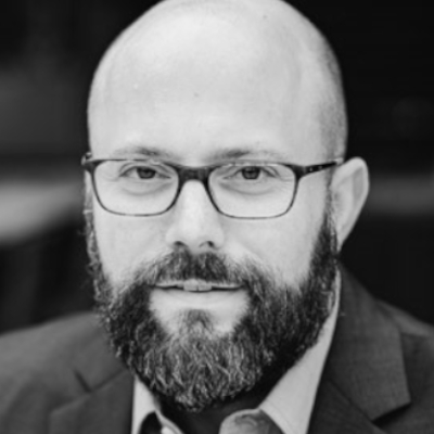 A speaker photo for Matthew Nichols