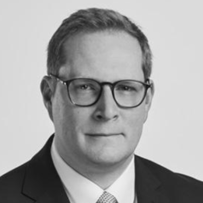 A speaker photo for James Corah