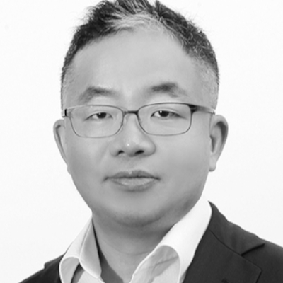 A speaker photo for Bruce (Hyun Hoe) Kim