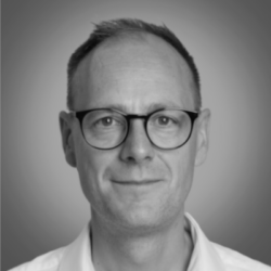 A speaker photo for Toby Mitchenall