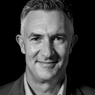 A speaker photo for Dean Cooper