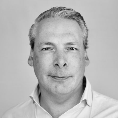 A speaker photo for Tim van Delden