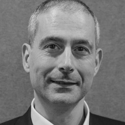 A speaker photo for Neil Moge